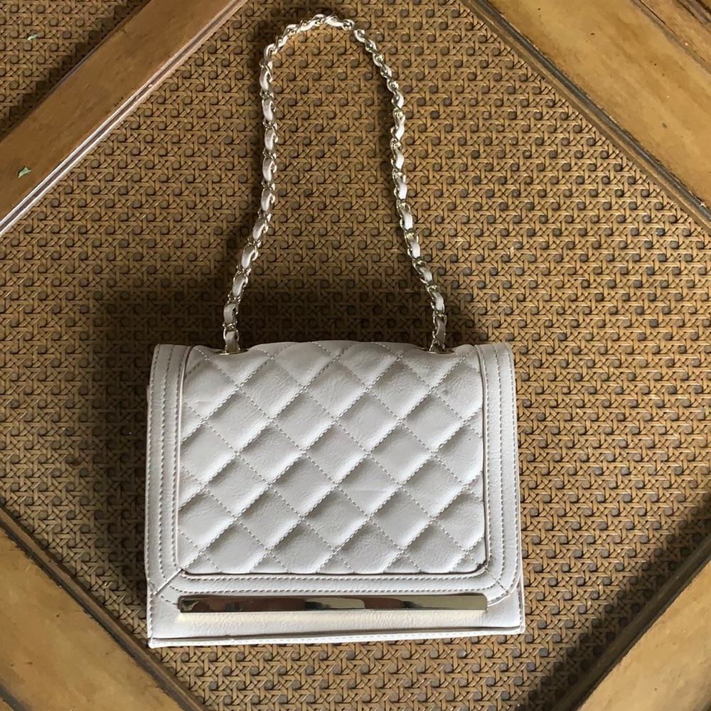 Leather quilted clutch with gold chain link strap!